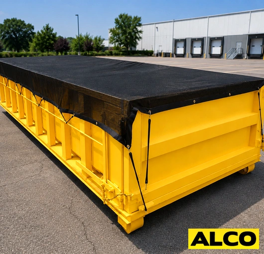 A heavy-duty tarp cover secured over an outdoor dumpster to contain debris and block weather exposure.
