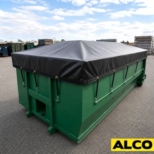 A heavy-duty tarp cover secured over an outdoor dumpster to contain waste and debris.