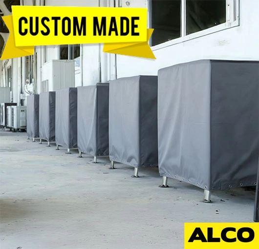 Heavy-duty polyester cover protects commercial AC unit from weather damage