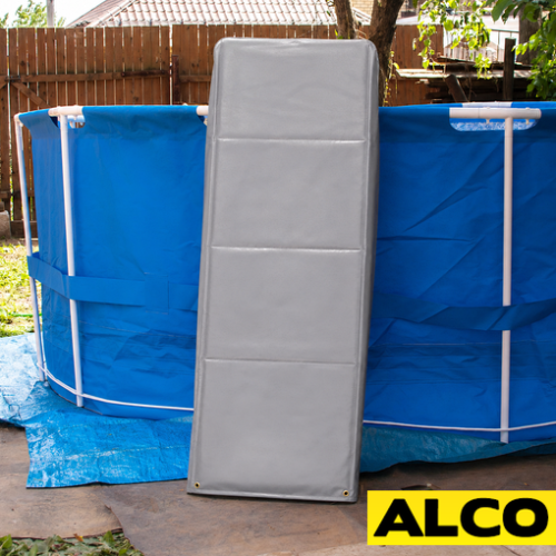 Custom-made all-weather covers fitted over pool ladder rails in an outdoor setting.