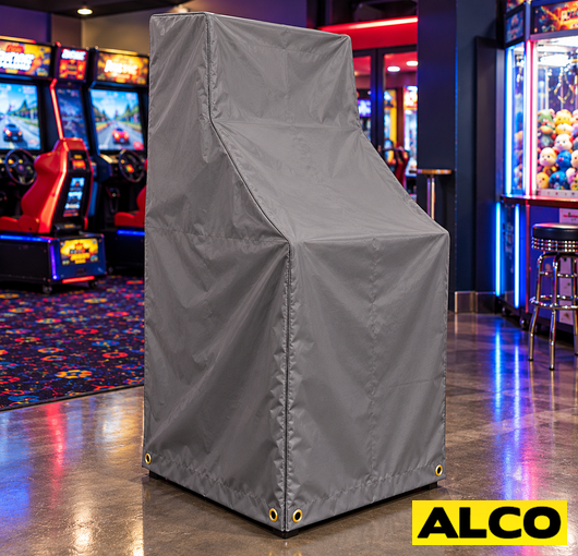 Protective covers fitted over arcade game cabinets to shield them from dust, moisture, and damage during storage.