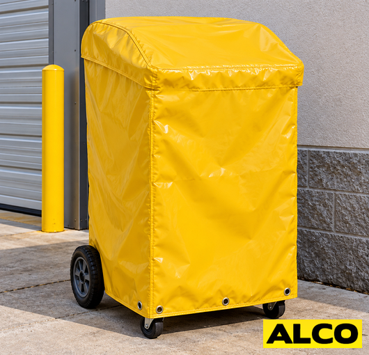 Alco spill containment cart cover fitted over an industrial cart to contain leaks and drips in a warehouse setting.