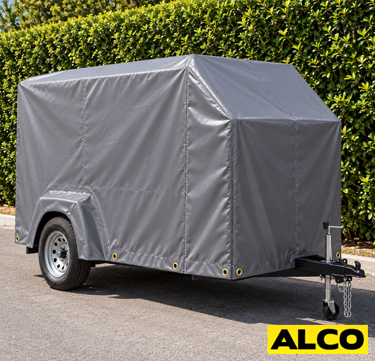 Waterproof trailer box cover from AKON fitted over a commercial trailer to protect cargo from weather.